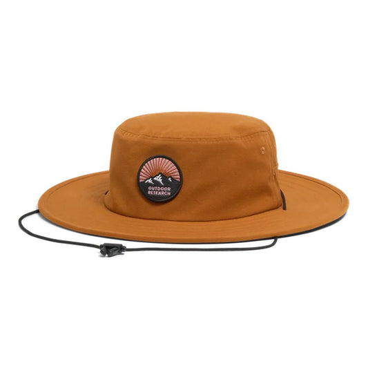 A front view of the Outdoor Research Heyday Boonie Hat in Dark Sedona with a patch and chin cord against a white background.