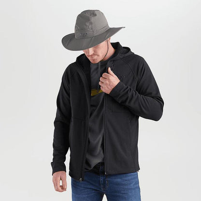 A model wears the Outdoor Research Sombriolet Sun Hat in Pewter, showing the wide brim and adjustable chin strap against a plain white background.
