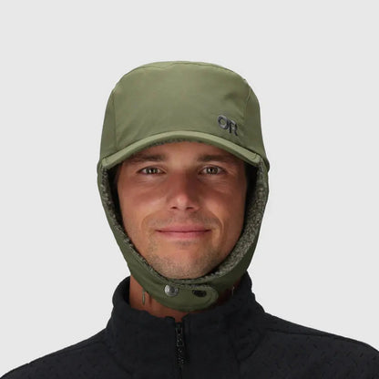 A front view of the Outdoor Research Whitefish Hat in Atlantic color on a model wearing a dark zip-up jacket against a plain background.