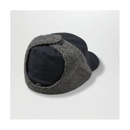 A top-down view of the Outdoor Research Whitefish Hat in Atlantic color, showing the ear flaps and black interior against a plain white background.