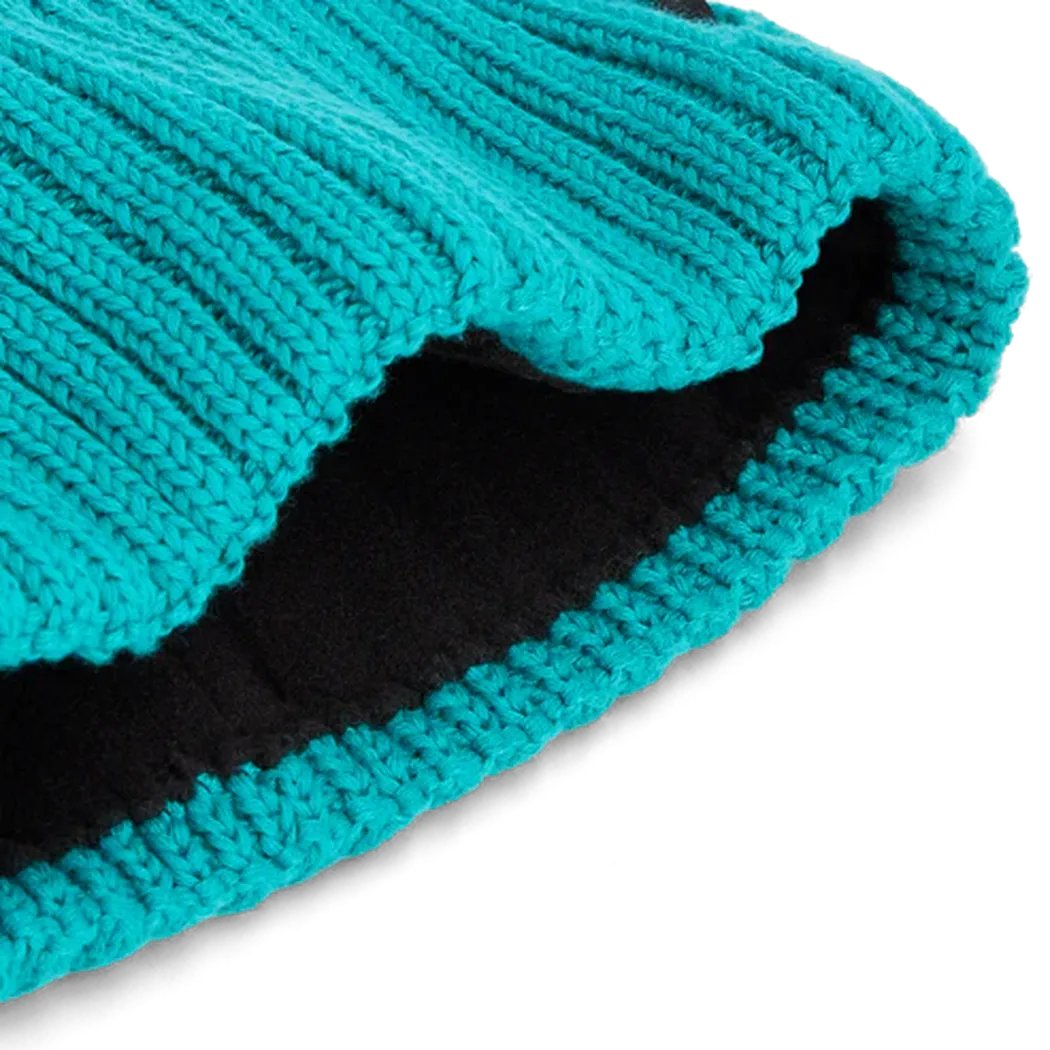 A close-up of the Outdoor Research Women's Liftie Beanie in Tidepool/Aurora showing the ribbed knit and black inner lining against a white background.