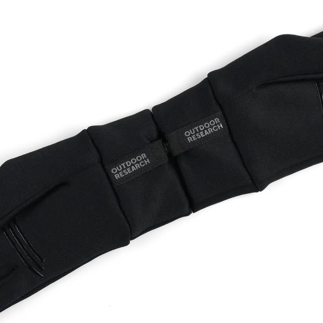 A close-up of the black Outdoor Research Women's Vigor Midweight Sensor Gloves showing the brand labels and a white background.