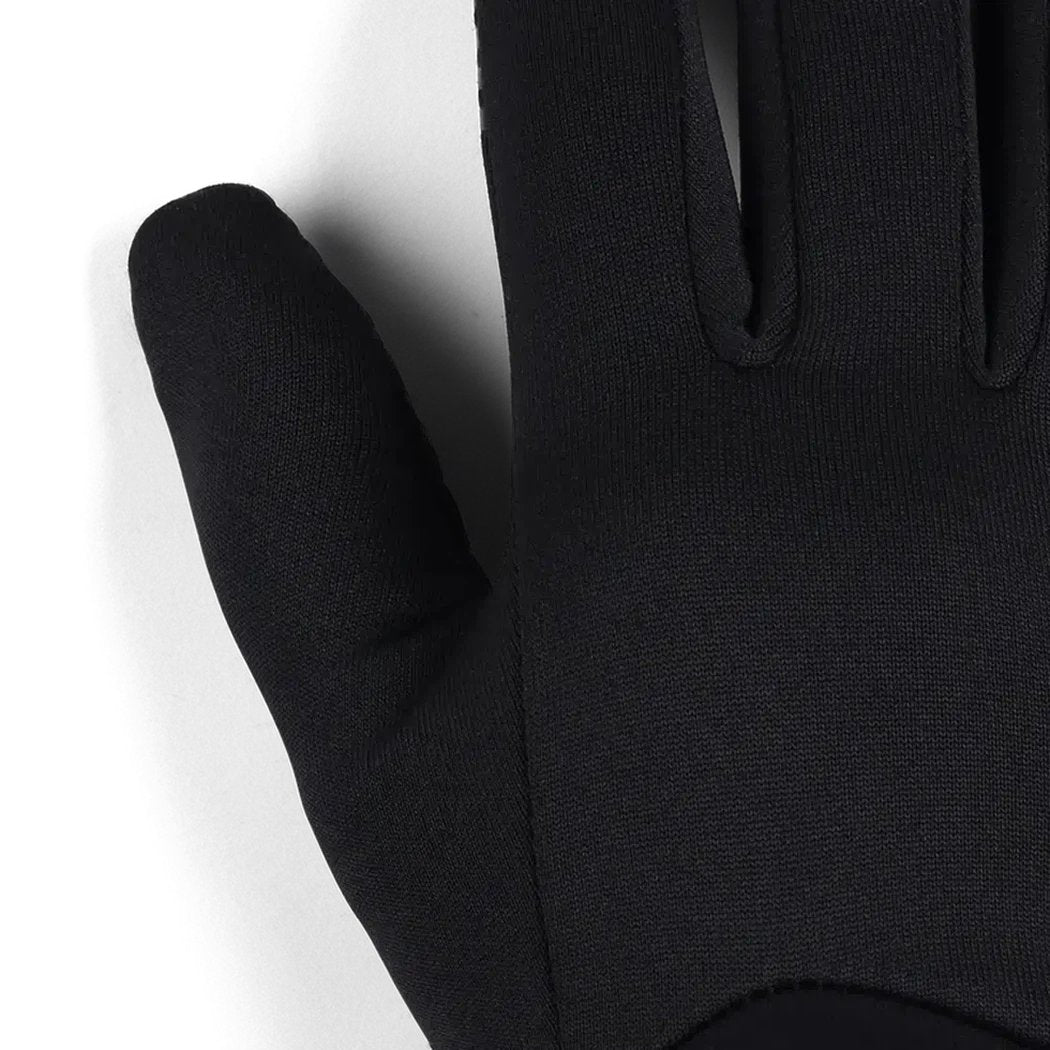 A close-up of the Outdoor Research Women's Vigor Midweight Sensor Gloves in Black, showing the textured palm and finger design against a white background.