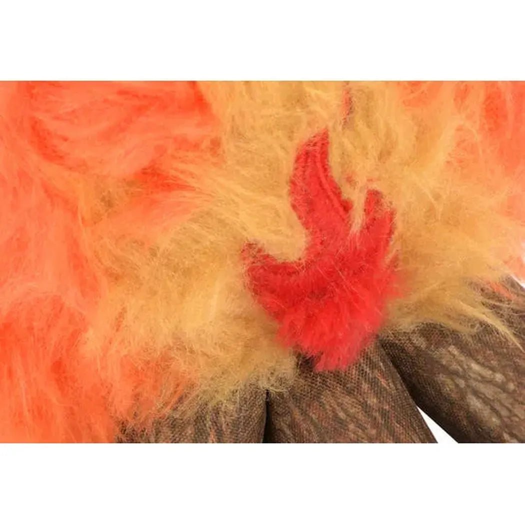 Close-up of the P.L.A.Y Camp Corbin Cozy Campfire toy showing the red flame detail on the orange and yellow fur.