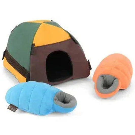 A side view of the P.L.A.Y Camp Corbin Trailblazing Tent with two colorful pet sleeping bags in front, set against a white background.