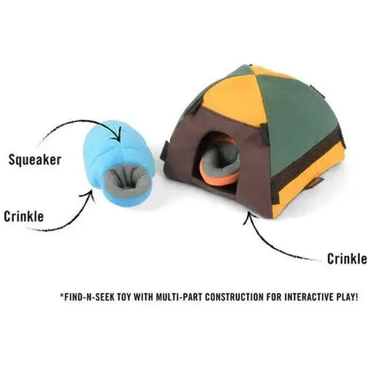 A side view of the P.L.A.Y Camp Corbin Trailblazing Tent with a blue squeaker and crinkle toy next to it.