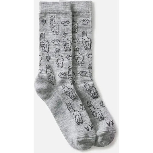 Light grey Paka Apparel Essential Sebastian Crew Socks with llama and cactus prints, shown from the front against a white background.