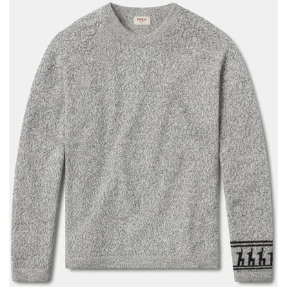 A front view of the Paka Apparel The Costa light grey sweater with a graphic on the cuff against a white background.