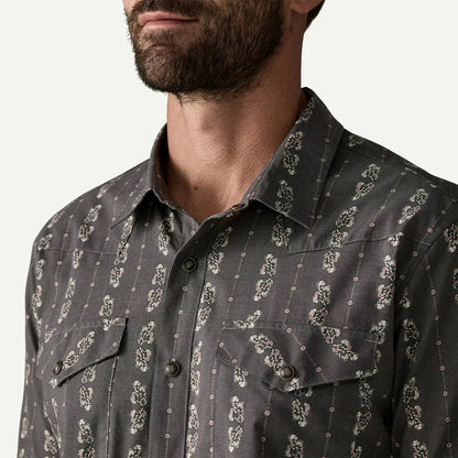 A front view of the Patagonia Men's Go To Western Shirt in Lowlands: Forge Grey showing chest pockets and a white background.