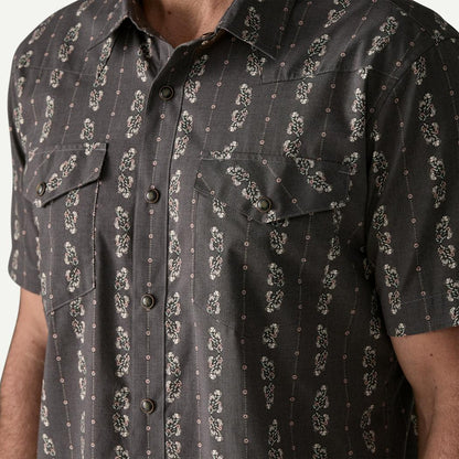 A close-up of the Patagonia Men's Go To Western Shirt in Lowlands: Forge Grey, showing chest pockets and a button-down front.