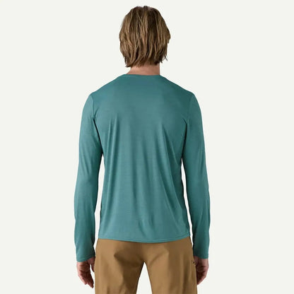Back view of the Patagonia Men's Long Sleeve Cap Cool Daily Shirt in Wetland Blue, showing a model wearing it against a plain white background.