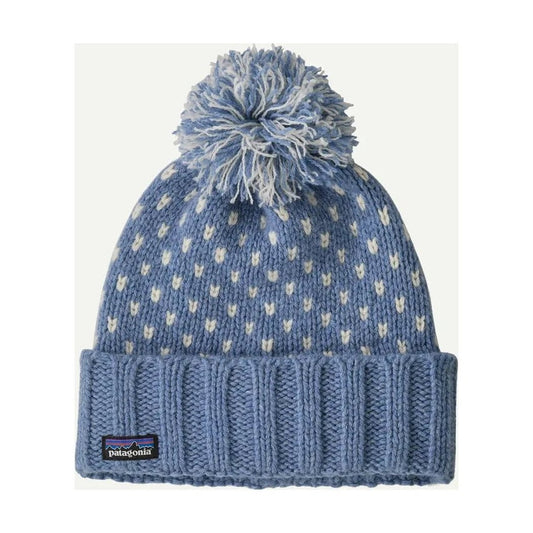 A front view of the Patagonia Snowbelle Beanie in Offset Dot: Burnished Red with a pom pom and ribbed cuff against a white background.