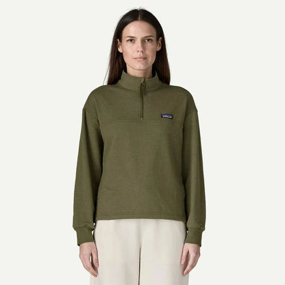 A front view of the Patagonia Women's Ahnya P/O in Basin Green with a half-zip and a small logo on the chest, worn by a model against a plain white background.