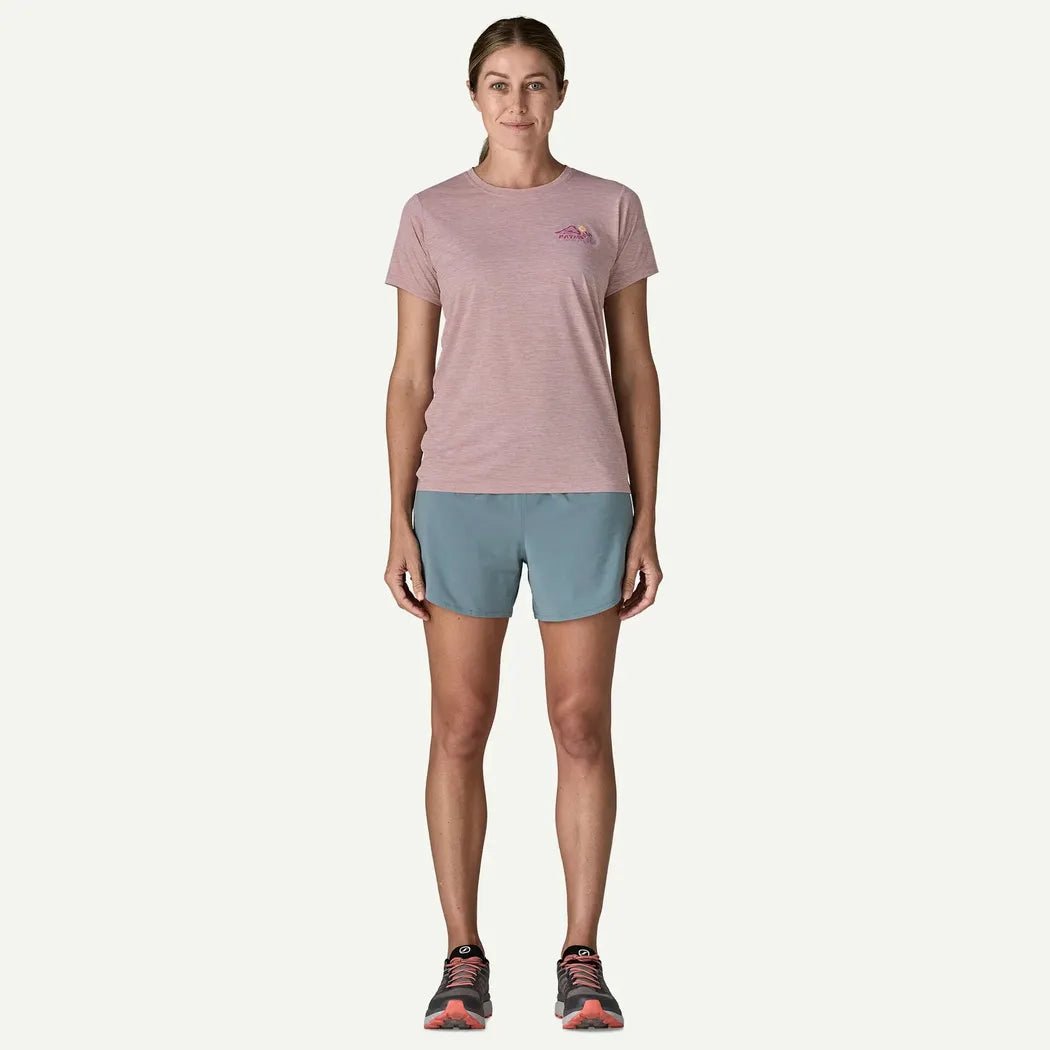 A front view of the Patagonia Women's Cap Cool Daily Shirt - TrailCheck in Quiet Violet on a model against a white background.
