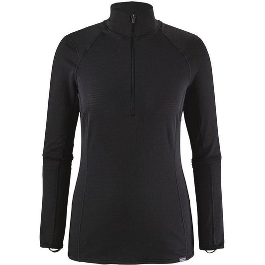 A front view of the Patagonia Women's Capilene Thermal Weight Zip-Neck in Black with a high collar and half-zip closure.
