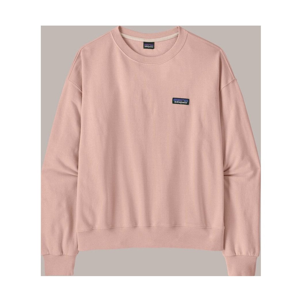 A front view of the Patagonia Women's Daily Crew in Pink Frost with a small logo patch on the chest and a light gray background.