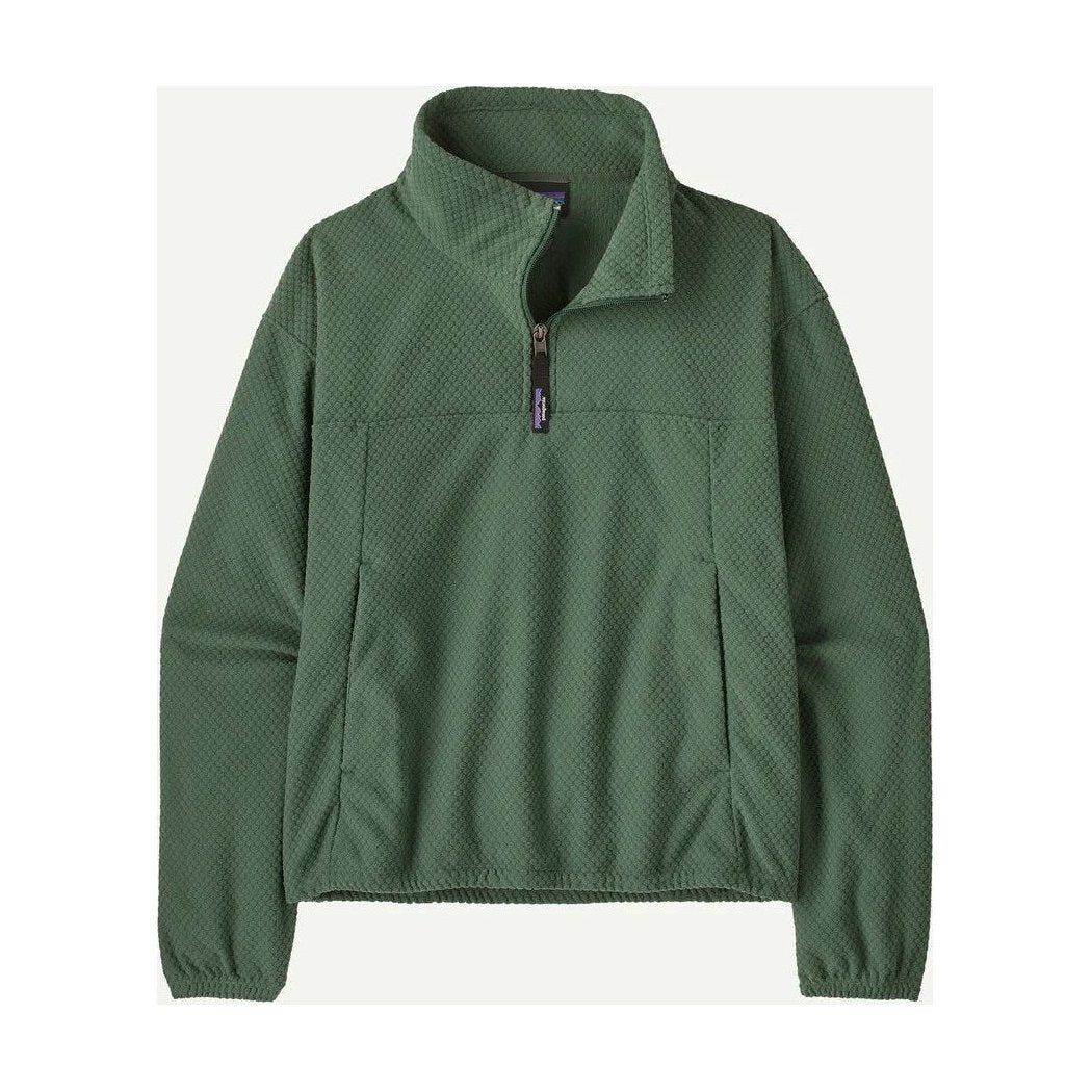 A front view of the Patagonia Womens Textured Fleece Pullover in Canopy Green showing the half-zip and front pockets against a light background.