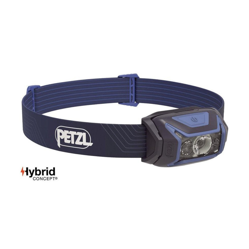 A front view of the Petzl Actik headlamp in Green on a white background.