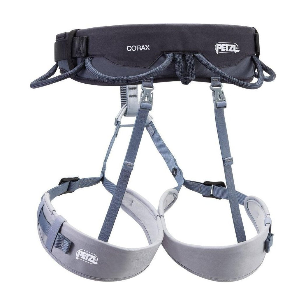 A front view of the Petzl Corax dark gray climbing harness with padded leg loops and a black waistbelt, photographed against a white background.
