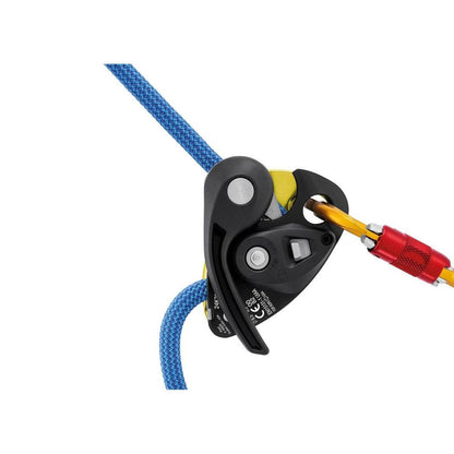 A close-up of the Petzl Grigri+ belay device in Green, showing the blue rope and red carabiner against a white background.