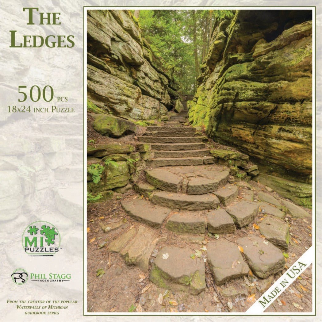 The Ledges 500 piece puzzle by Phil Stagg Photography shows a stone staircase in a rocky, forested gorge.