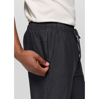 Side view of the Prana Men's Altitude Tracker LT Jogger in Black Heather showing the elastic waistband and drawstring against a white background.
