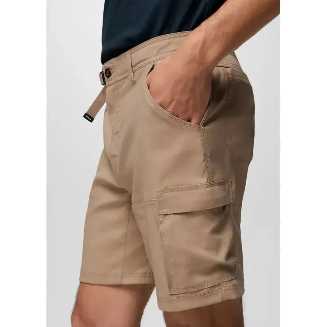 Side view of the Prana Men's Stretch Zion Short in Sandbar showing the cargo pocket and model wearing it against a plain background.