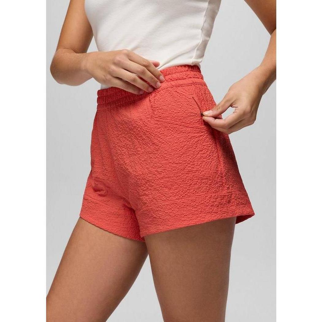 A front view of the Prana Sample - Women's Coastal Sol Short in Lychee showing the elastic waistband and pocket against a light gray background.