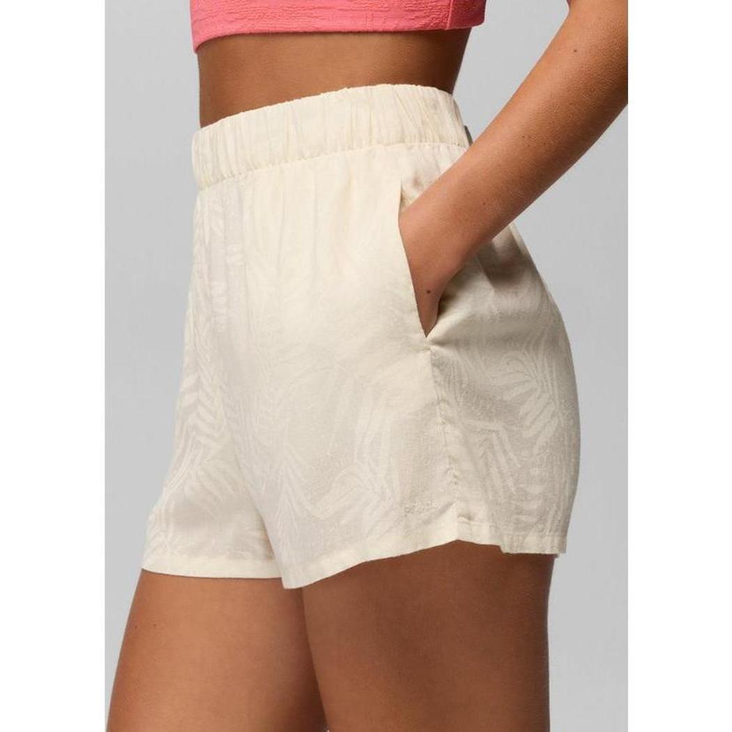 Side view of the Prana Sample - Women's The Bahamas Short in BeachPebbleShor showing the elastic waistband and pocket against a light background.