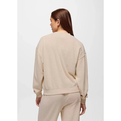 Back view of the Prana Women's Cozy Up Crew Sweatshirt in Canvas Heather on a model against a plain white background.