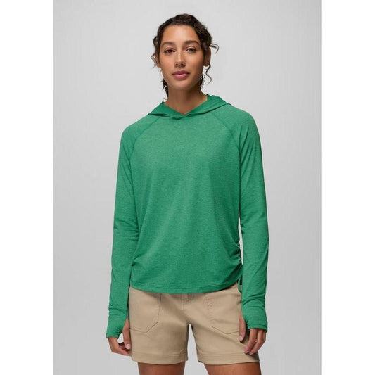 A front view of the Prana Women's Eileen Hoodie in Jade on a model wearing khaki shorts against a light gray background.