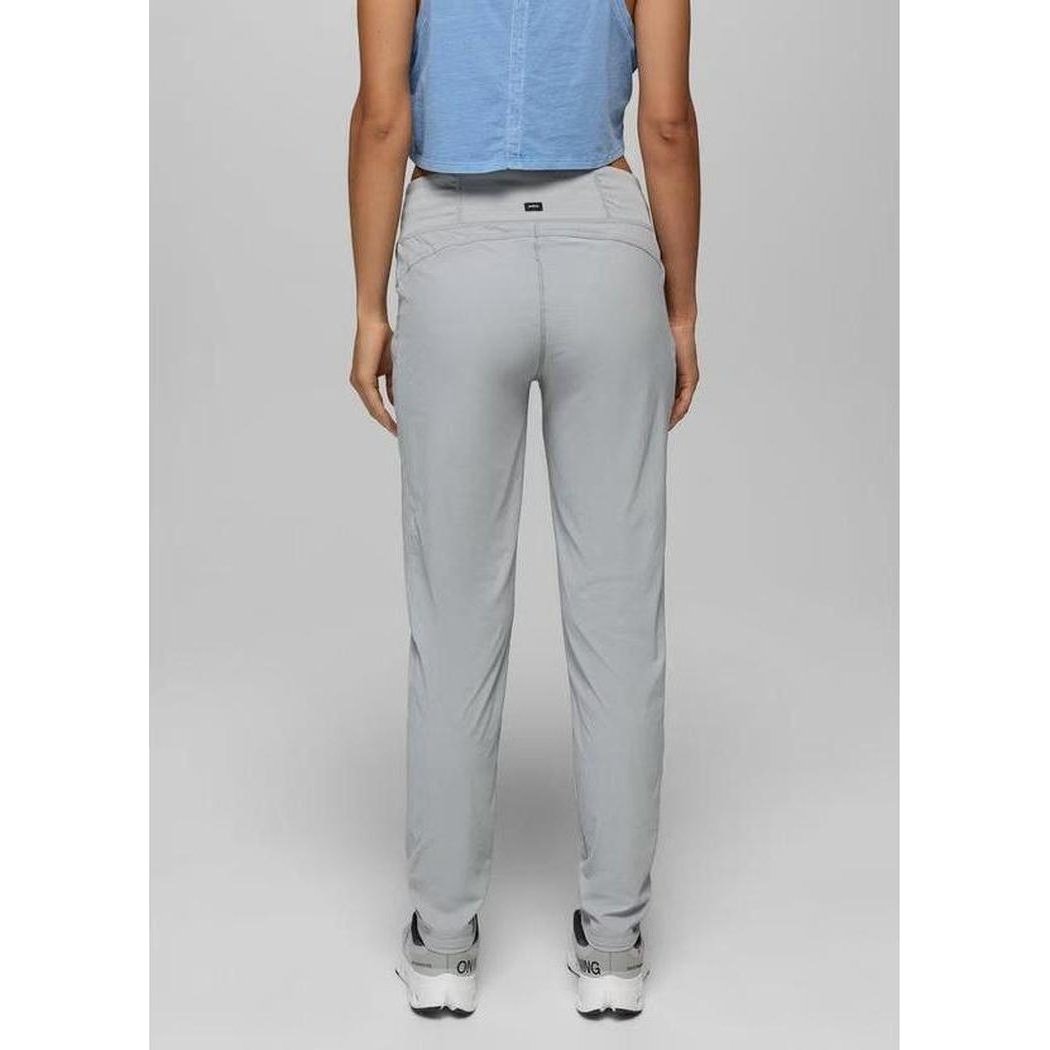 Back view of the Prana Women's Koen Mid Rise Daily Pant in Grey Blue, showing the model wearing them against a plain background.