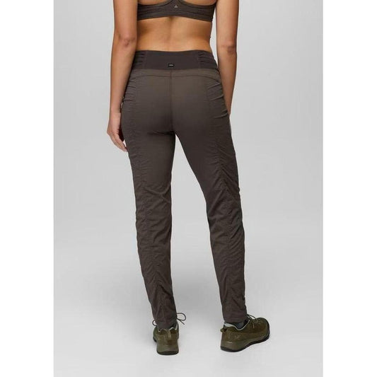 Back view of the Prana Women's Koen Mid Rise Pant in Basalt showing the high waist and slim fit against a plain background.