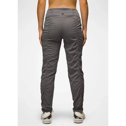 Back view of the Prana Women's Koen Pant in Black showing the ruched side panels against a plain white background.