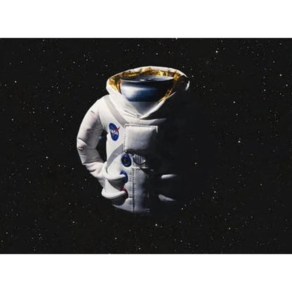 A front view of the Sandy White Puffin Coolers The Space Suit cooler against a starry space background.