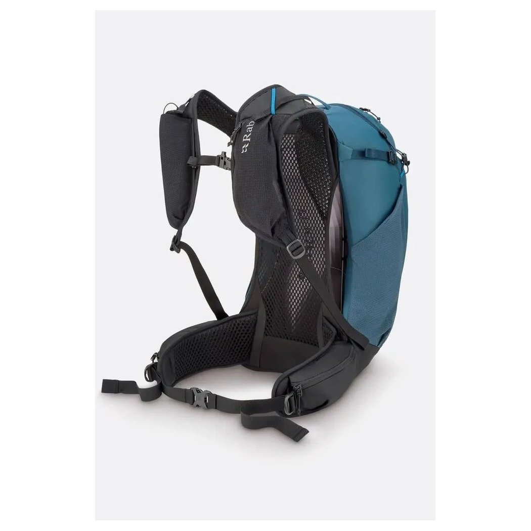 Side view of the Rab Airox 24 backpack in Tempest Blue showing the mesh back panel and shoulder straps against a white background.