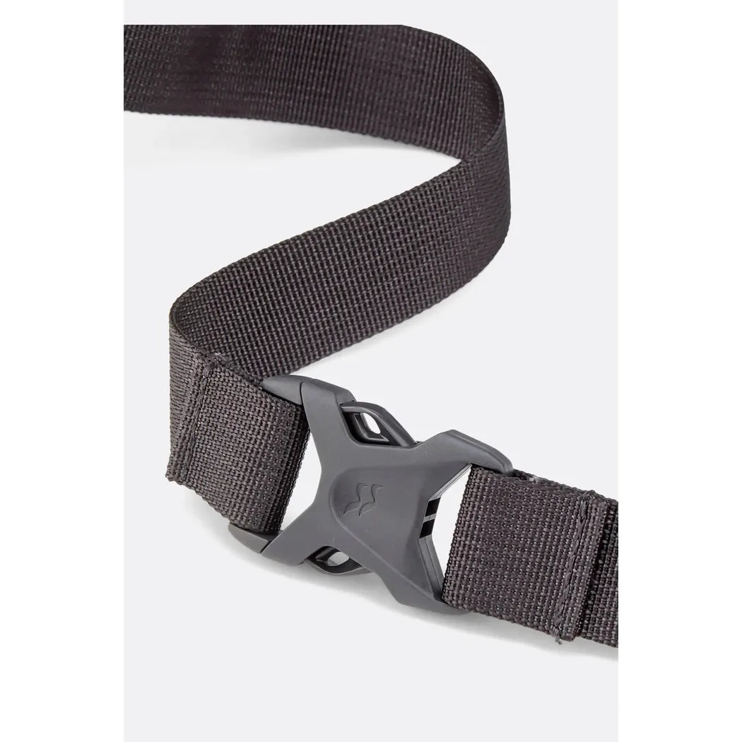 A close-up of the Rab Protium 6 bag's charcoal-colored strap and buckle against a white background.