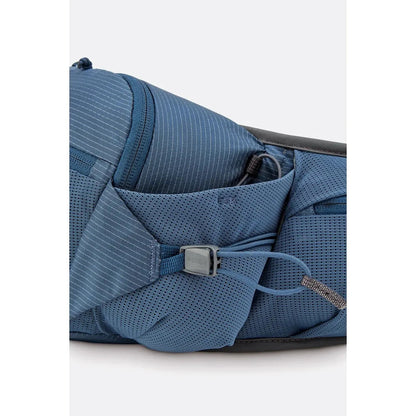 Side view of the Rab Protium 6 in Anthracite showing the front pocket and zipper against a white background.
