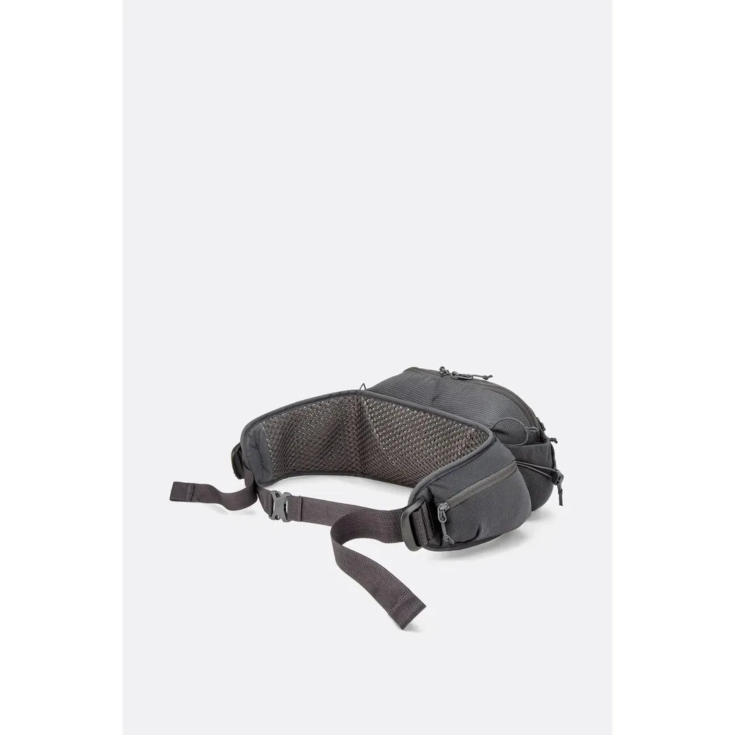 A charcoal Rab Protium 6 waist pack with mesh lining and adjustable straps displayed against a plain white background.
