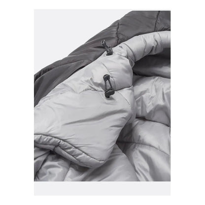 Left zip detail of the Rab Radeon -6C / 20F LNG sleeping bag in Sage/Graphene, showing the synthetic insulation and zipper pull.