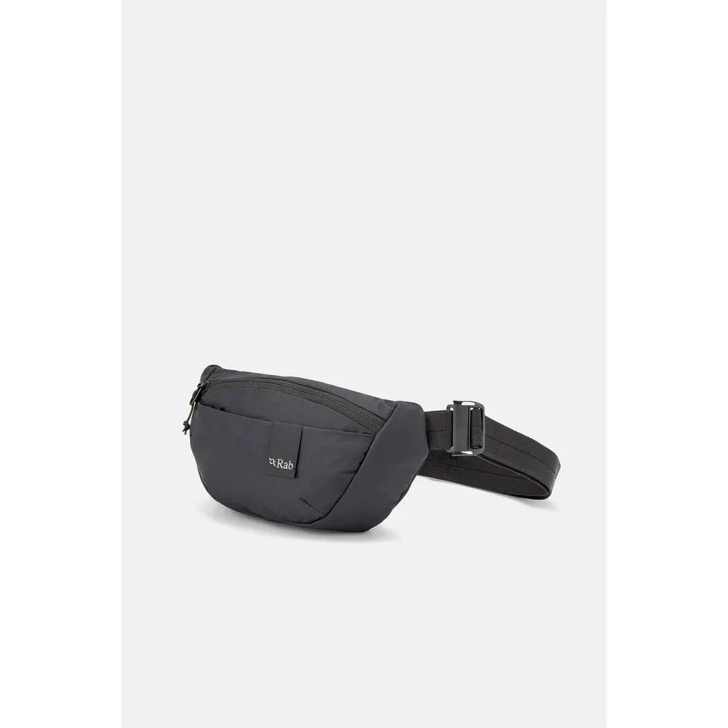 A side view of the Rab Tygen 2 black fanny pack with a buckle strap against a plain white background.