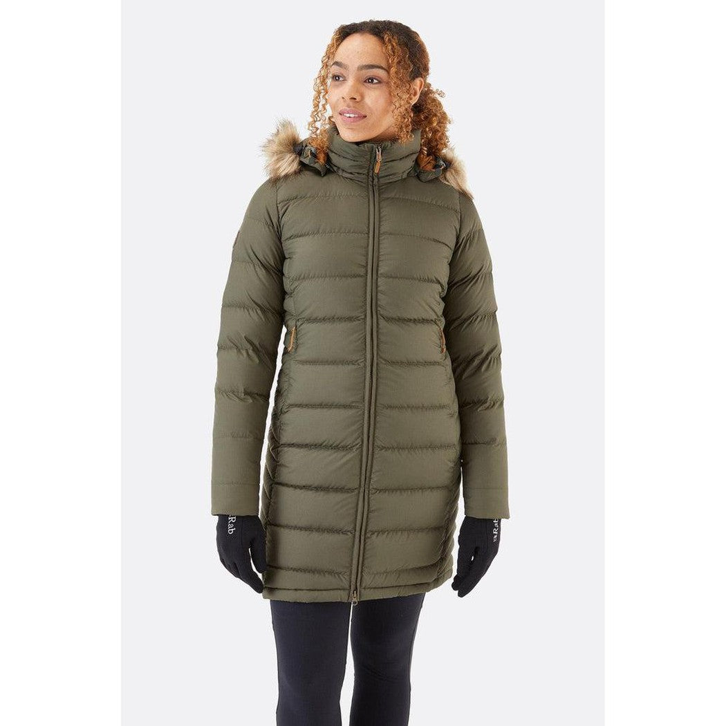 A front view of the Rab Women's Deep Cover Parka in Army color, showing the model wearing it with black gloves against a plain white background.