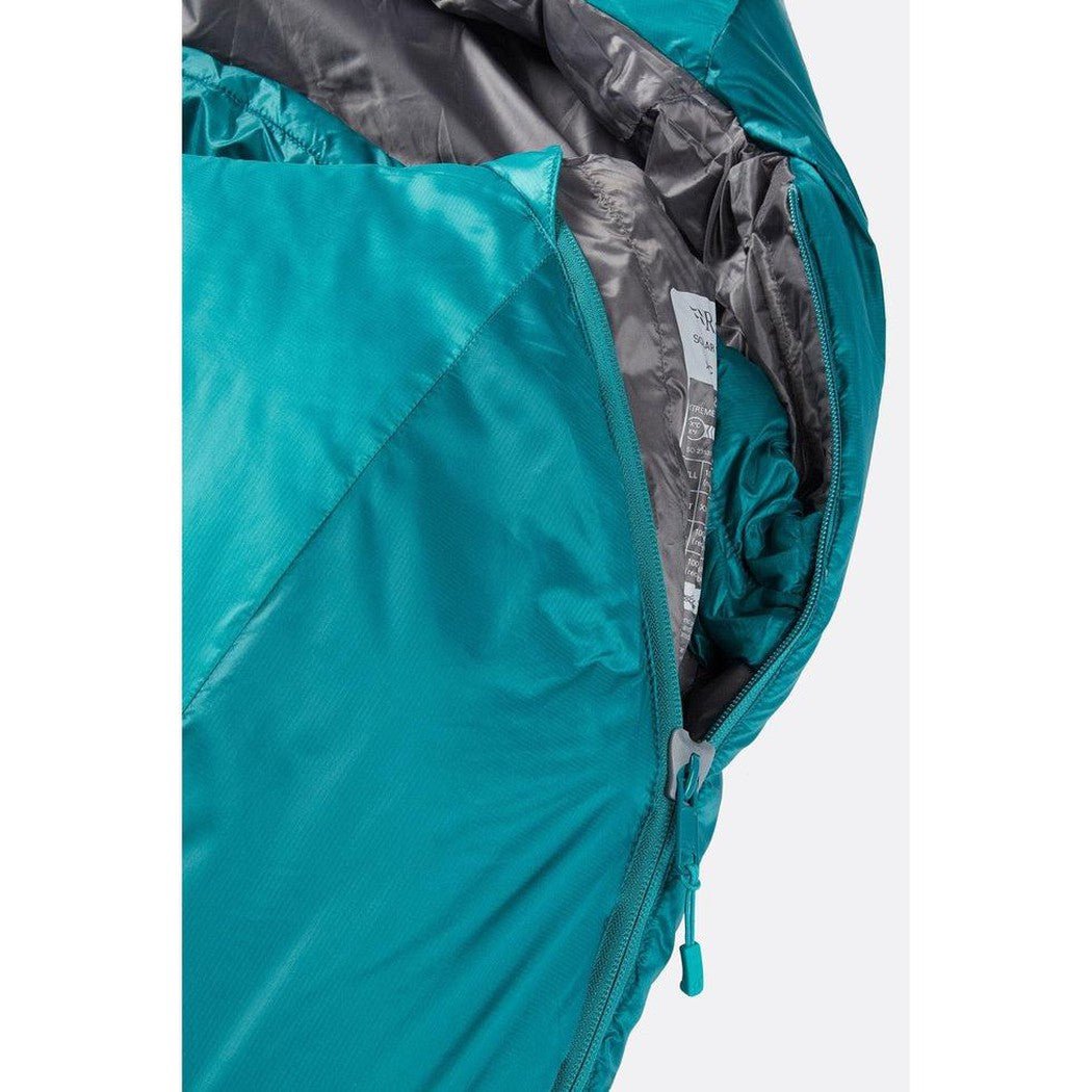 Side view of the Rab Women's Solar Eco 2 in Tasman showing the zipper and interior lining against a white background.