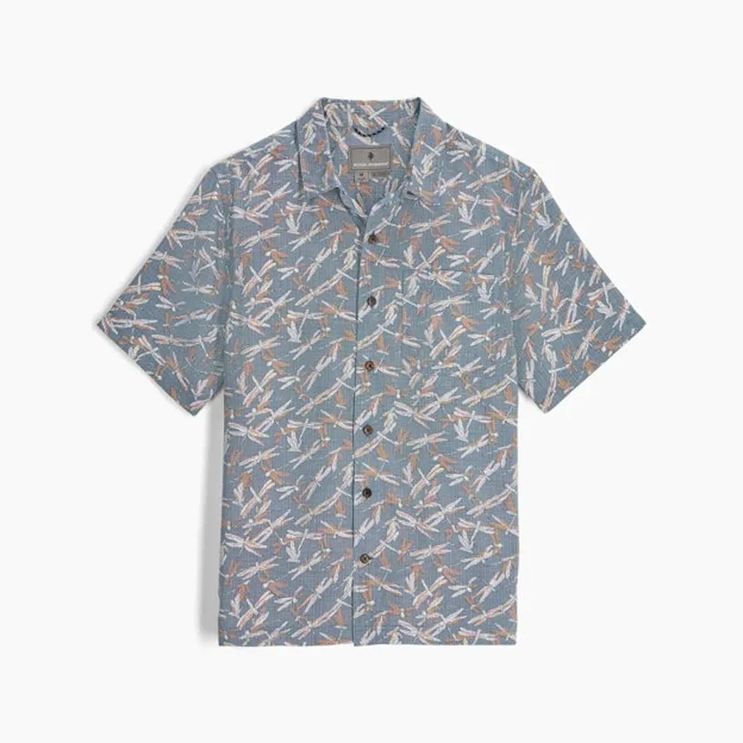A front view of the Royal Robbins Men's Camino Pucker Short Sleeve in Freshwater Botanist Pt with a light blue background.