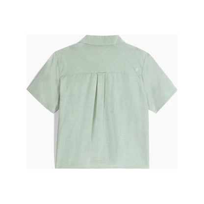 Back view of the Royal Robbins Women's Desert Pucker Short Sleeve in Sage Leaf showing the pleat detail against a white background.