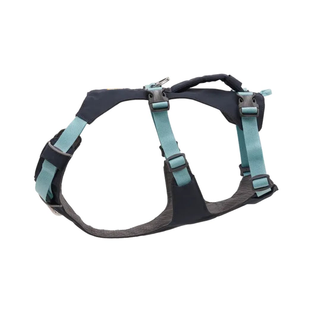 A side view of the Ruffwear Flagline Dog Harness With Handle in Blue Dusk showing the padded handle and adjustable straps against a white background.