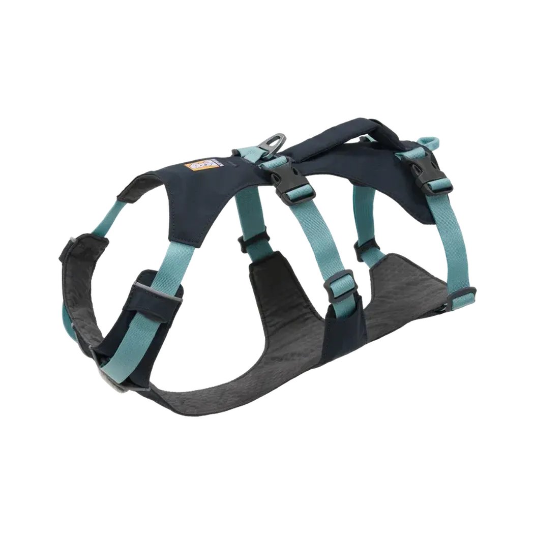 A side view of the Ruffwear Flagline Dog Harness With Handle in Blue Dusk showing the padded chest and back panels against a white background.