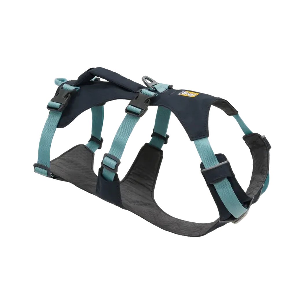 Side view of the Ruffwear Flagline Dog Harness With Handle in Blue Dusk showing the padded chest and back panels against a white background.