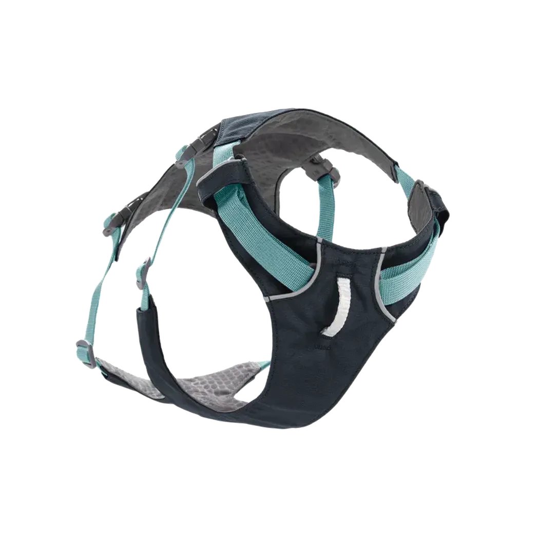 Side view of the Ruffwear Flagline Dog Harness With Handle in Blue Dusk showing the padded handle and reflective accents against a white background.