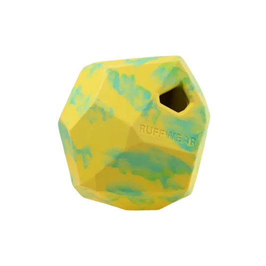 A top-down view of the Ruffwear Gnawt-a-rock in Dandelion Yellow with a hole and the brand name visible against a white background.